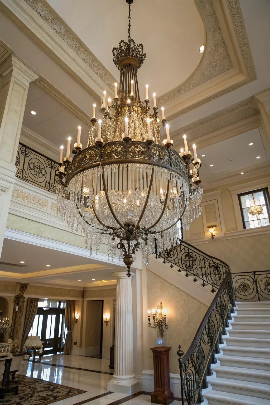 A stunning chandelier brings refinement to a two-story foyer.
