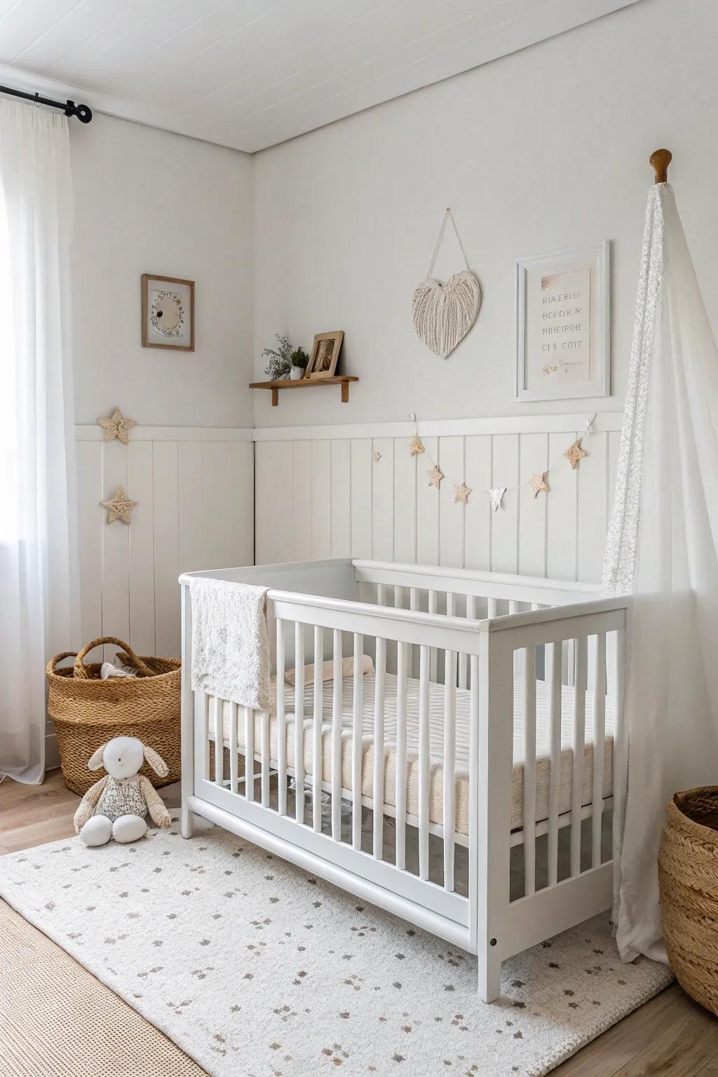 A white cot serves as the centerpiece in a minimalist nursery setting.