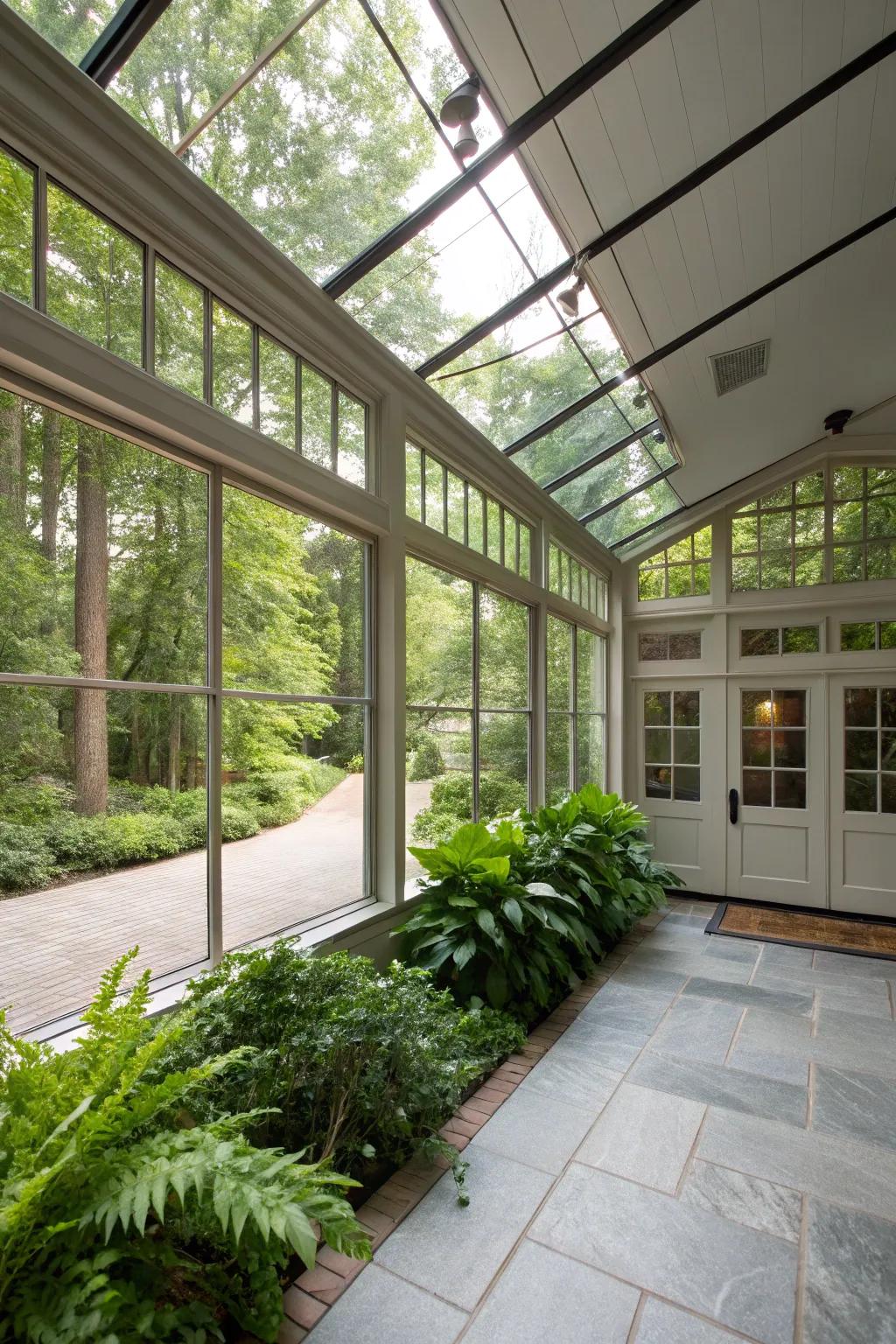 A glass-enclosed breezeway that welcomes the outdoors, creating a light-filled transition between the garage and house.