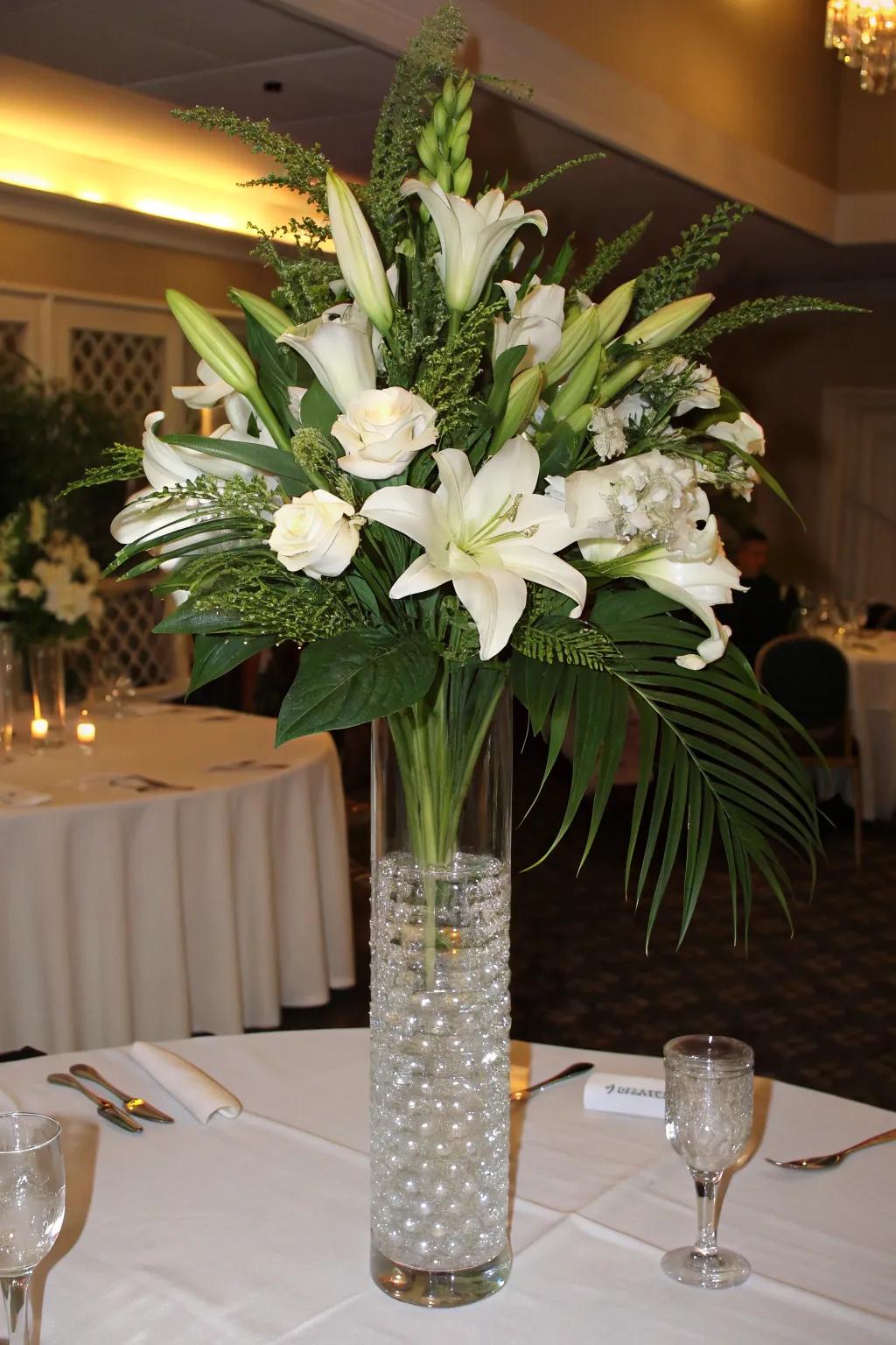 Classic floral arrangement showcasing tall white lilies and lush greenery.