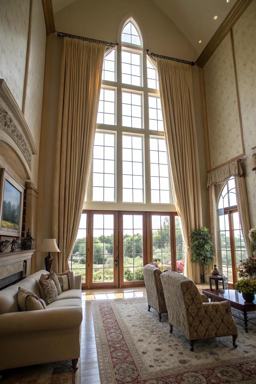 Extensive draperies visually extend the room's height, contributing a sophisticated ambiance to spaces with elevated ceilings.