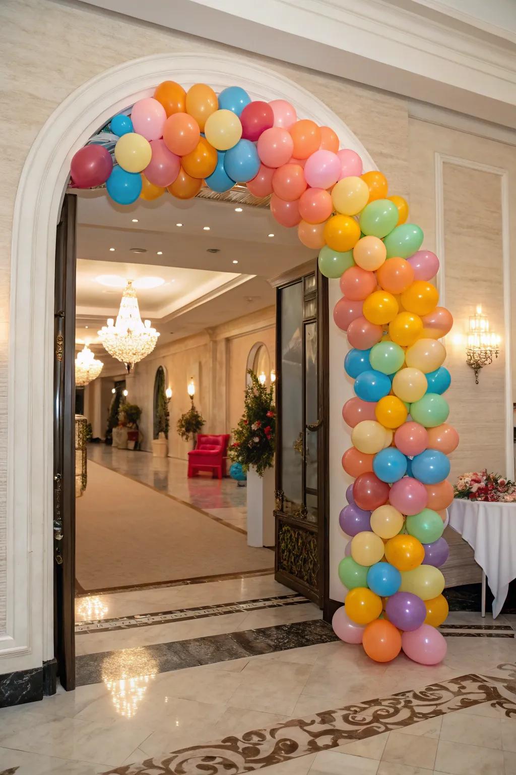A striking balloon arch elegantly frames an entrance, utilizing different sizes and shades for a lively visual impact.
