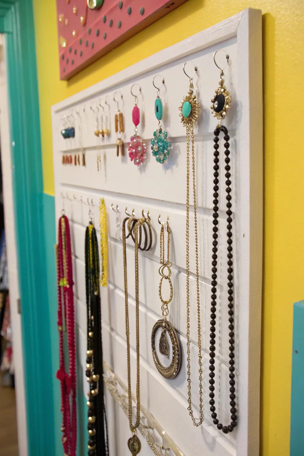 Showcase your jewelry as art with wall-mounted hooks.