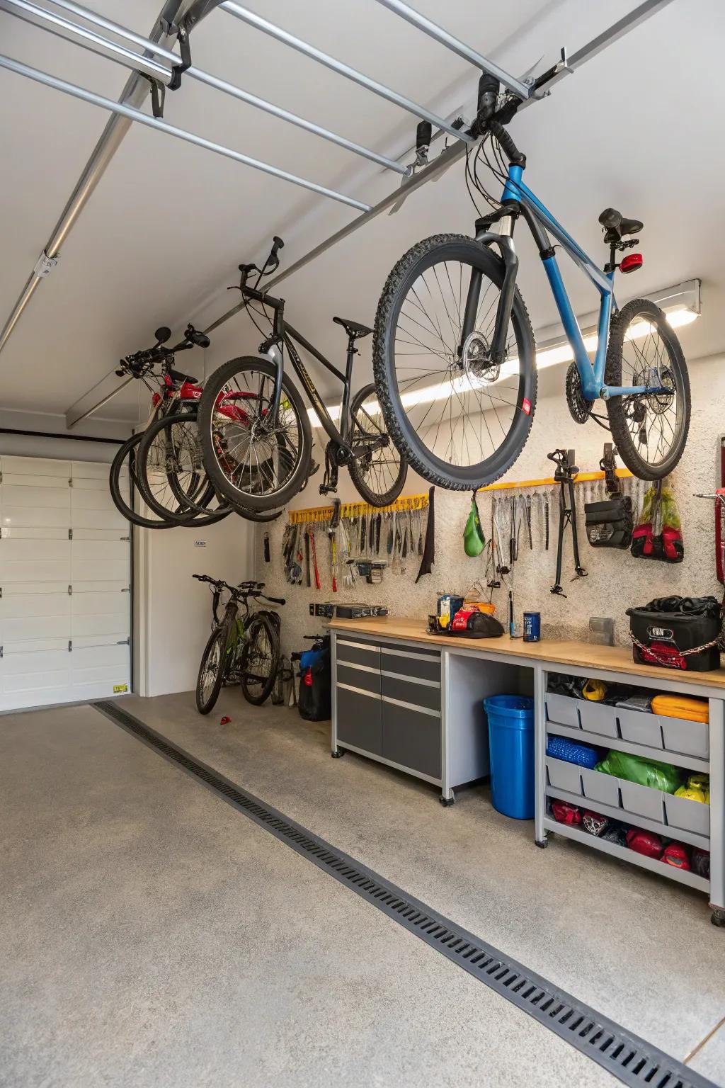 Bicycles suspended overhead using a pulley system, which maximizes available floor space.