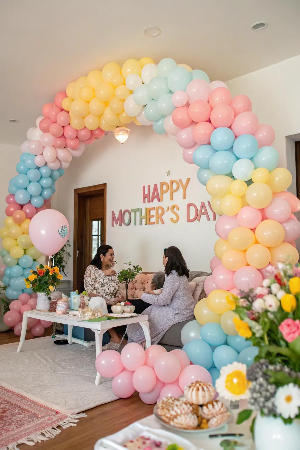 A stunning soft tones balloon garland provides the perfect atmosphere for a Mother's Day gathering.