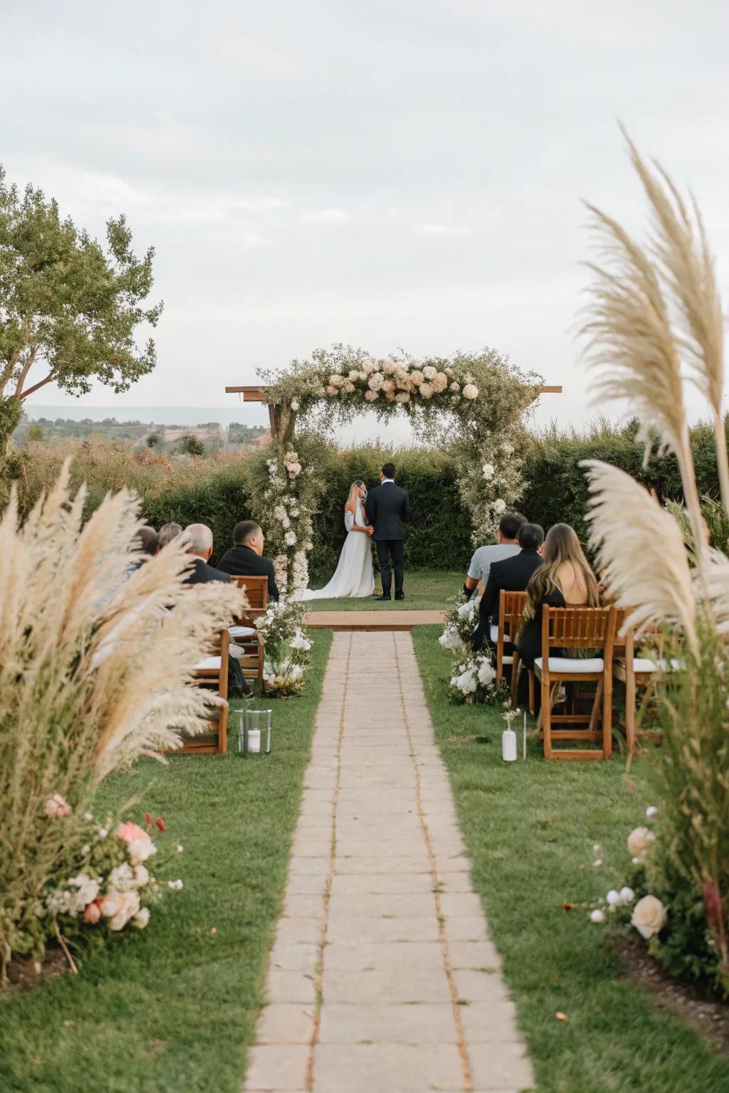 Elegant plume grass arrangements defining a stunning wedding sanctuary.
