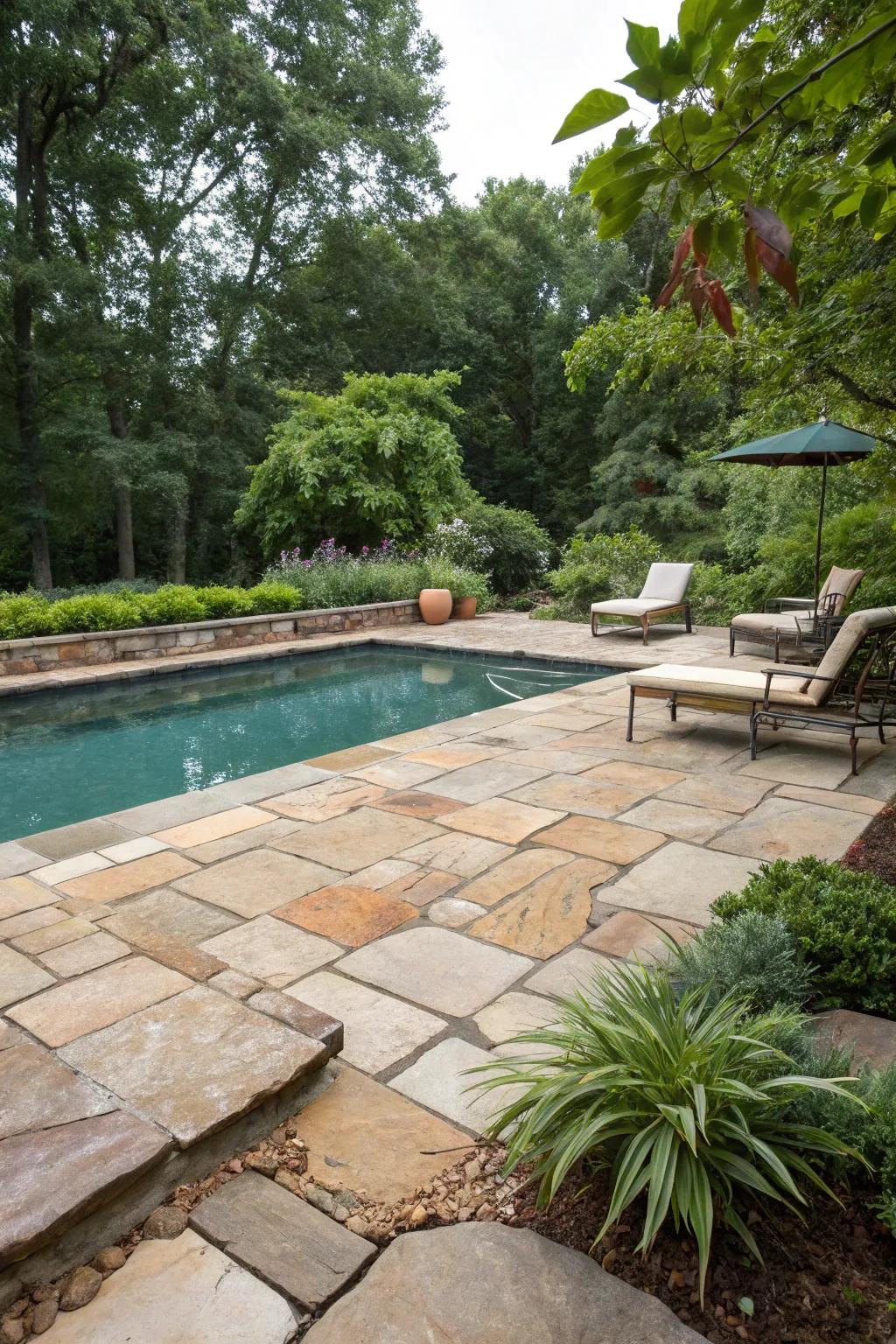 These natural stone pavers deliver an enduring and organic sophistication to the poolside.