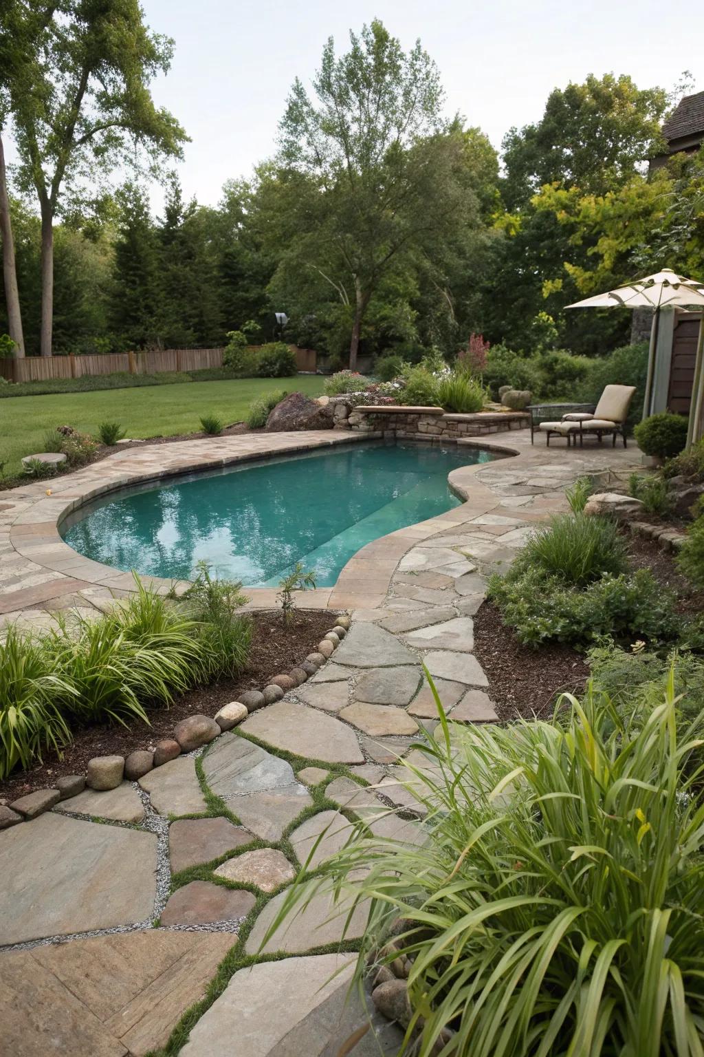 A freeform pool elegantly placed within a natural backyard setting.