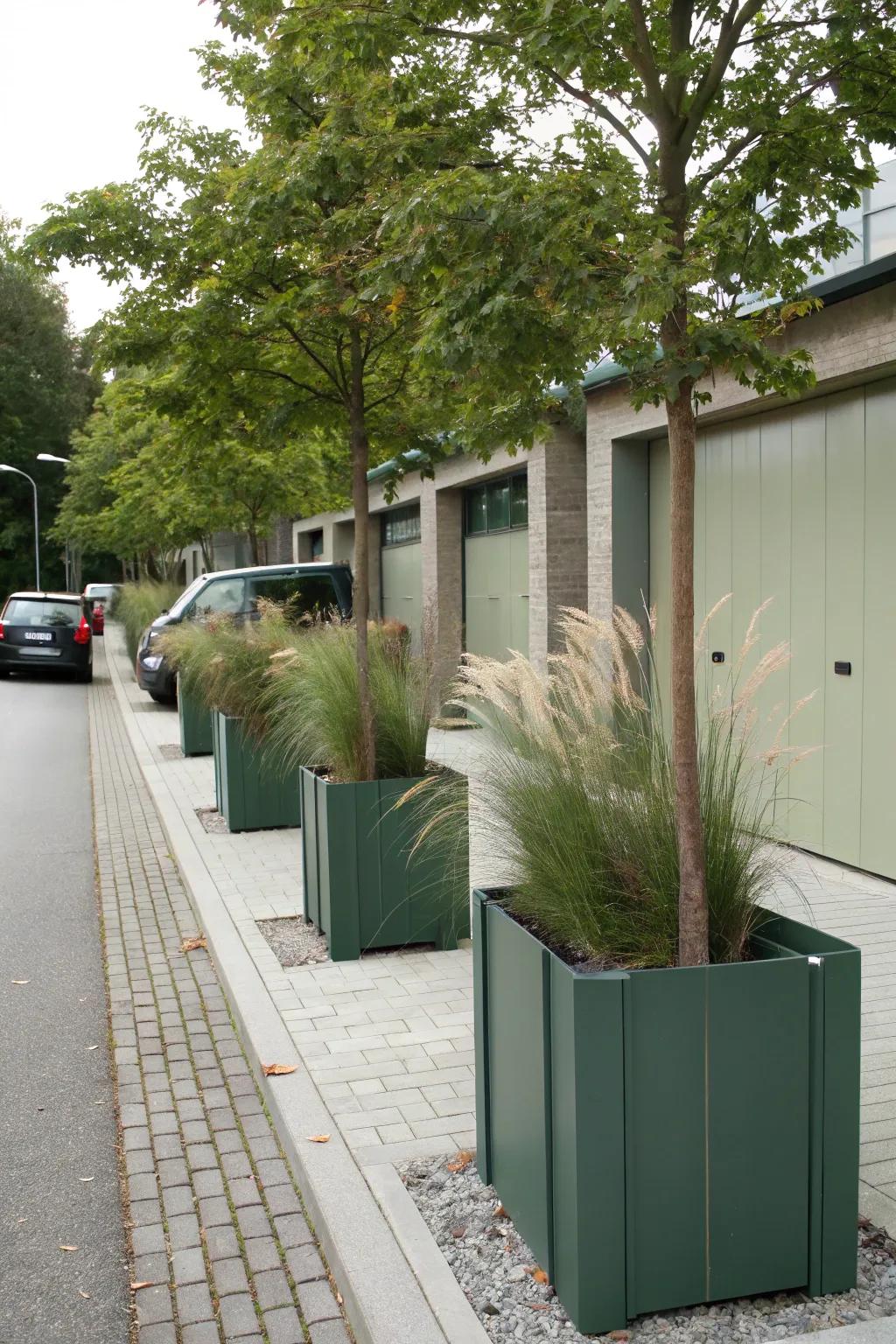 Tall planters defining a sophisticated and grand entrance to the garage.