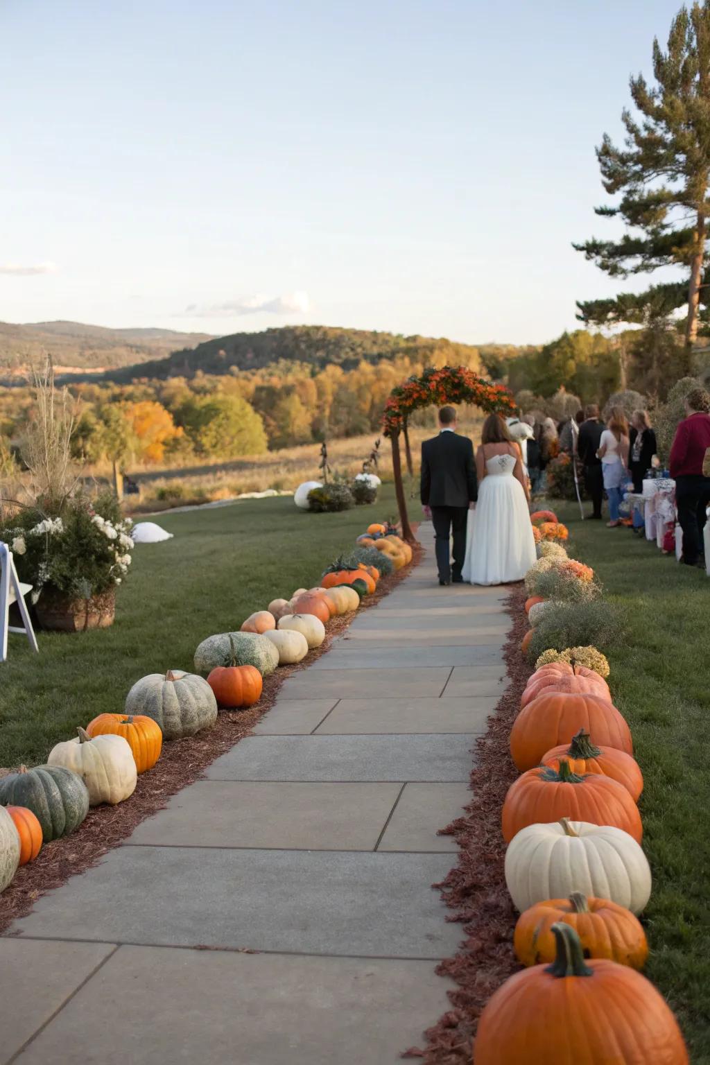 An enchanting path lined with squashes directing guests to a wedding venue.