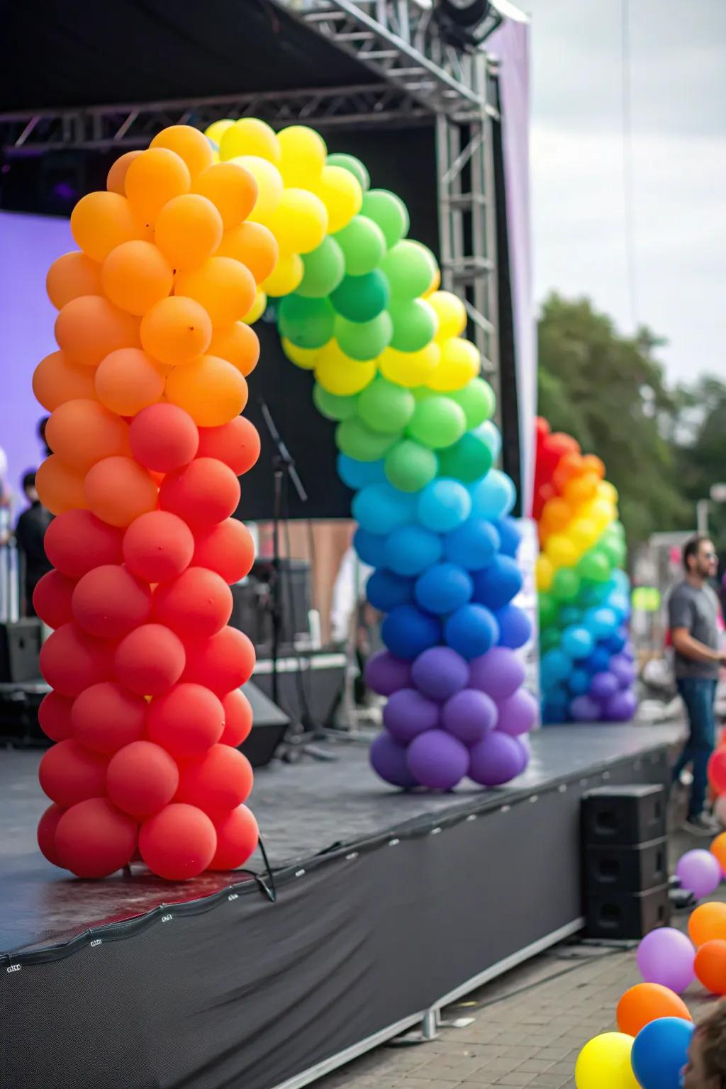 A stage showcasing a rainbow-inspired balloon decoration design.