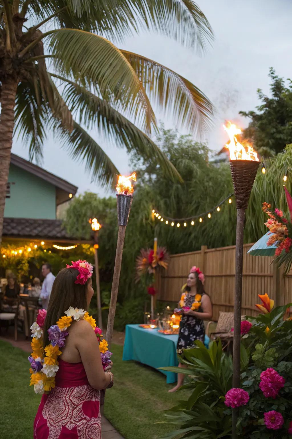 Guests enjoying a tropical luau party complete with tiki torches and leis.
