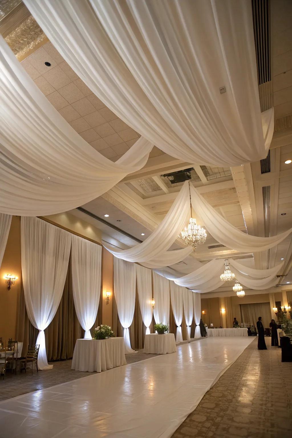Refined drapery introduces an element of romance and sophistication to the wedding locale.