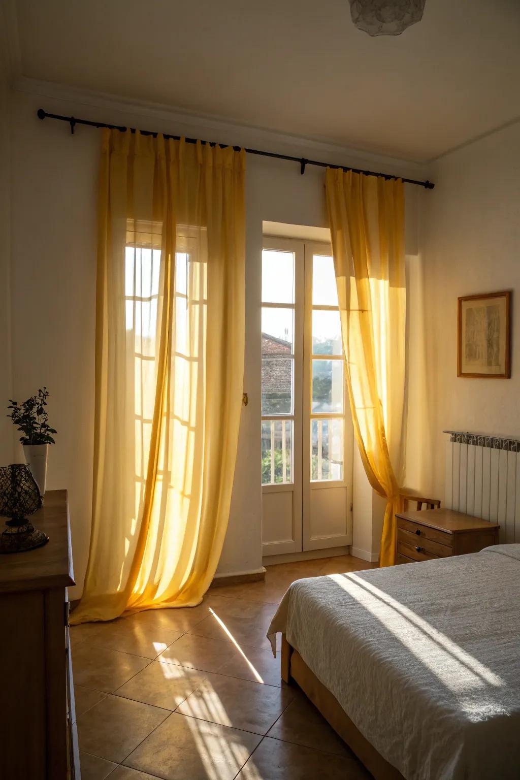 Delicate yellow window coverings introduce sunshine and foster a breezy atmosphere in the bedroom.
