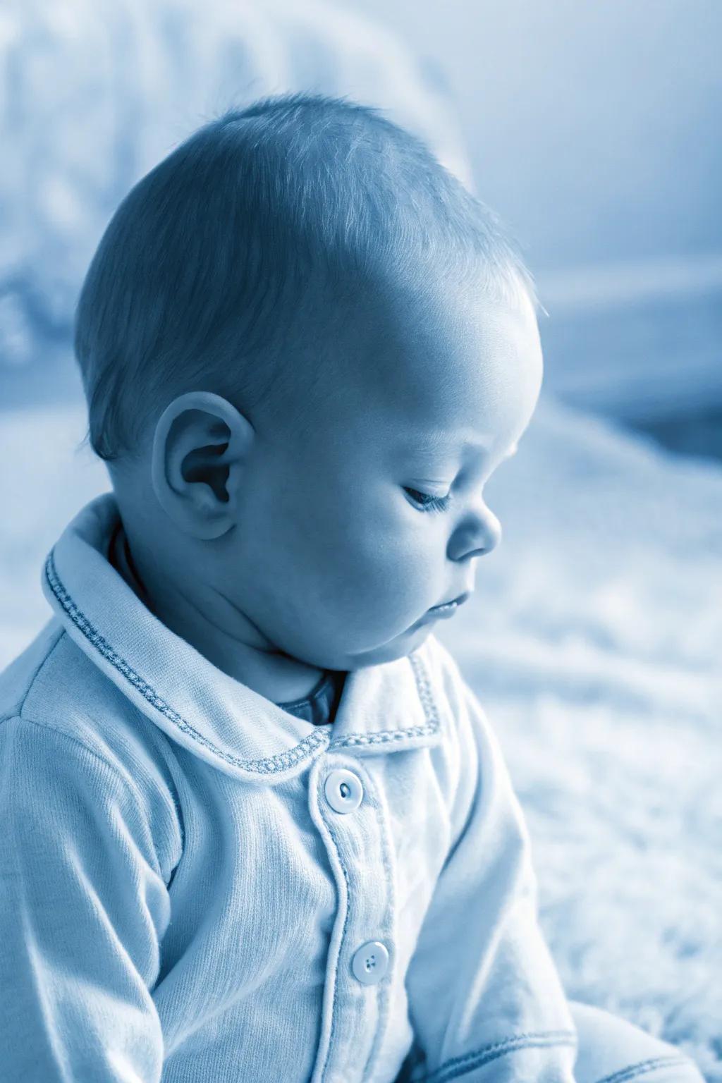 Monochrome enchantment for a refined baby image.