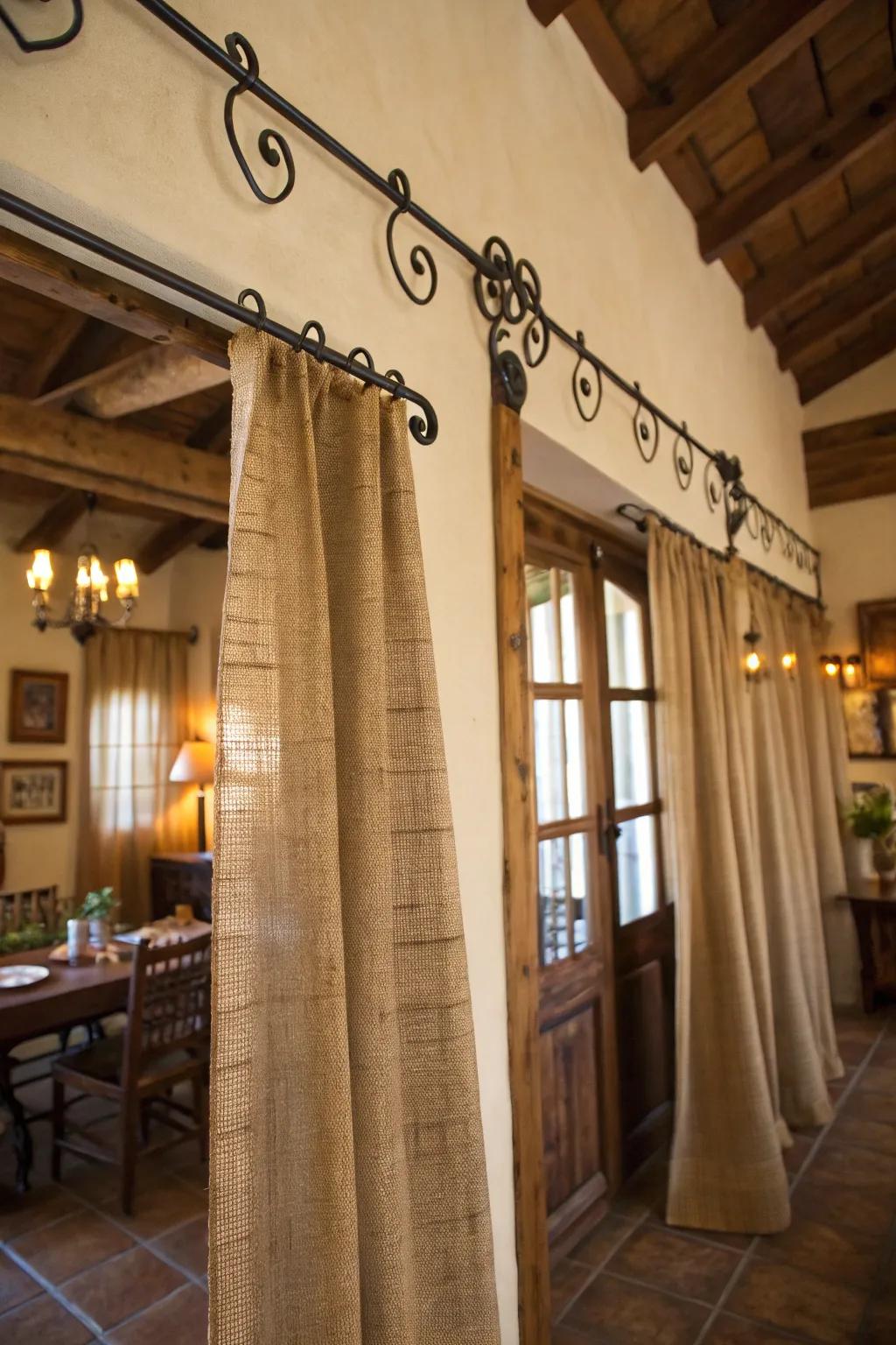 Down-to-earth elegance through material window coverings and wrought iron rods.