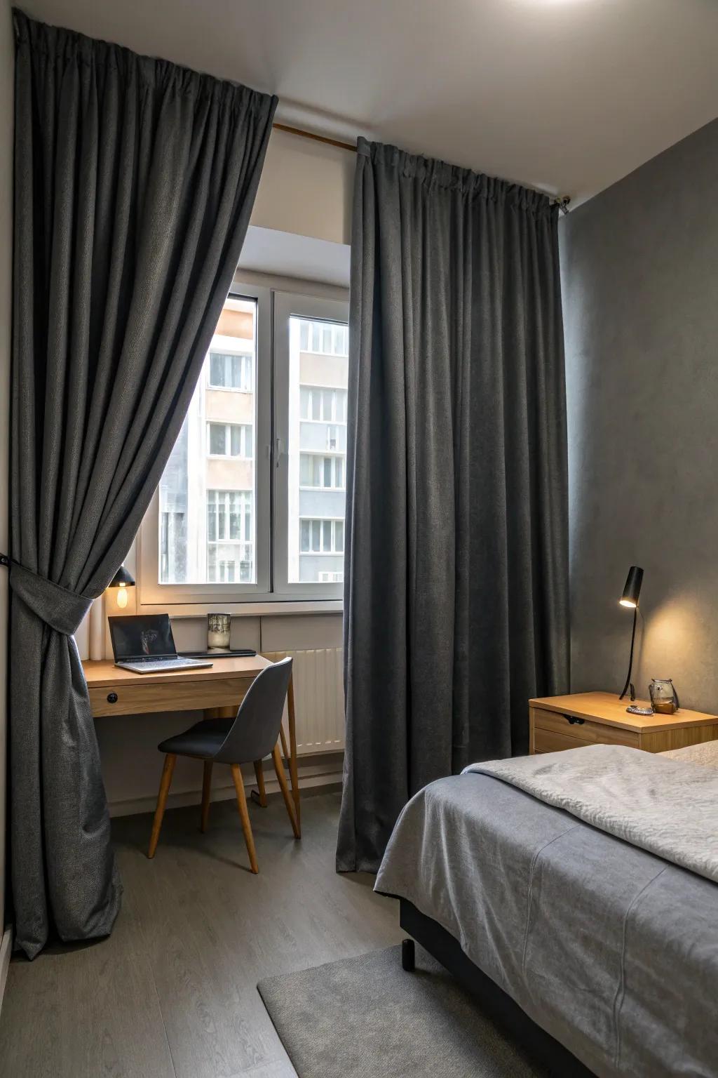 Dark grey curtains append luxury alongside functionality.