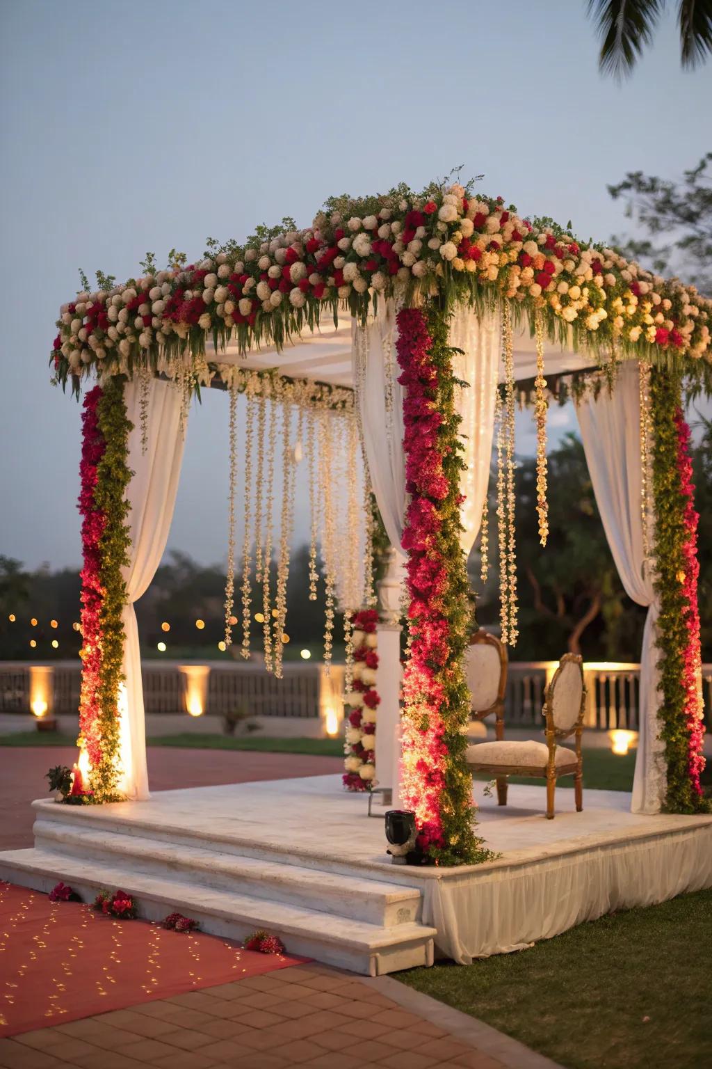 Suspending bloom adornments contributing layers of beauty to the mandap.