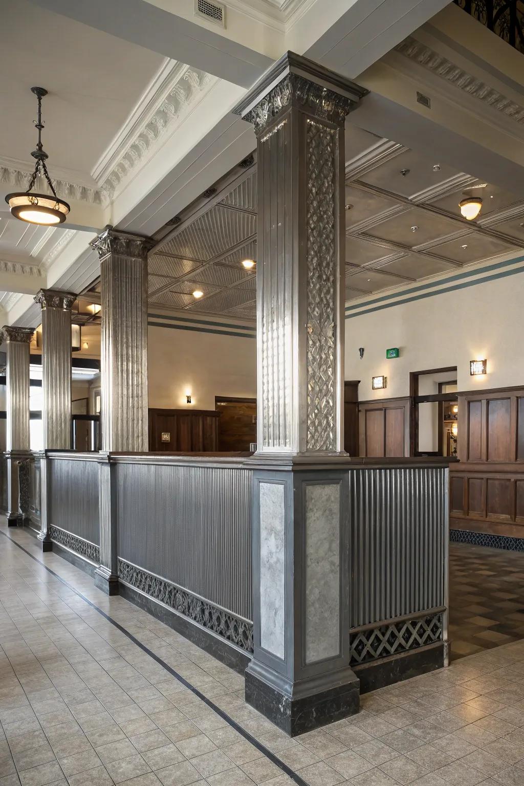 Incorporate a distinctive element by wrapping metallic wall paneling around pillars.