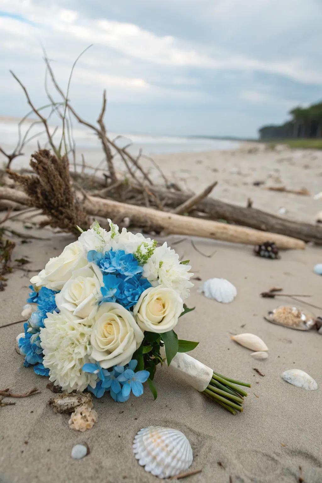 Beach-themed flower arrangement with blue and white blooms.
