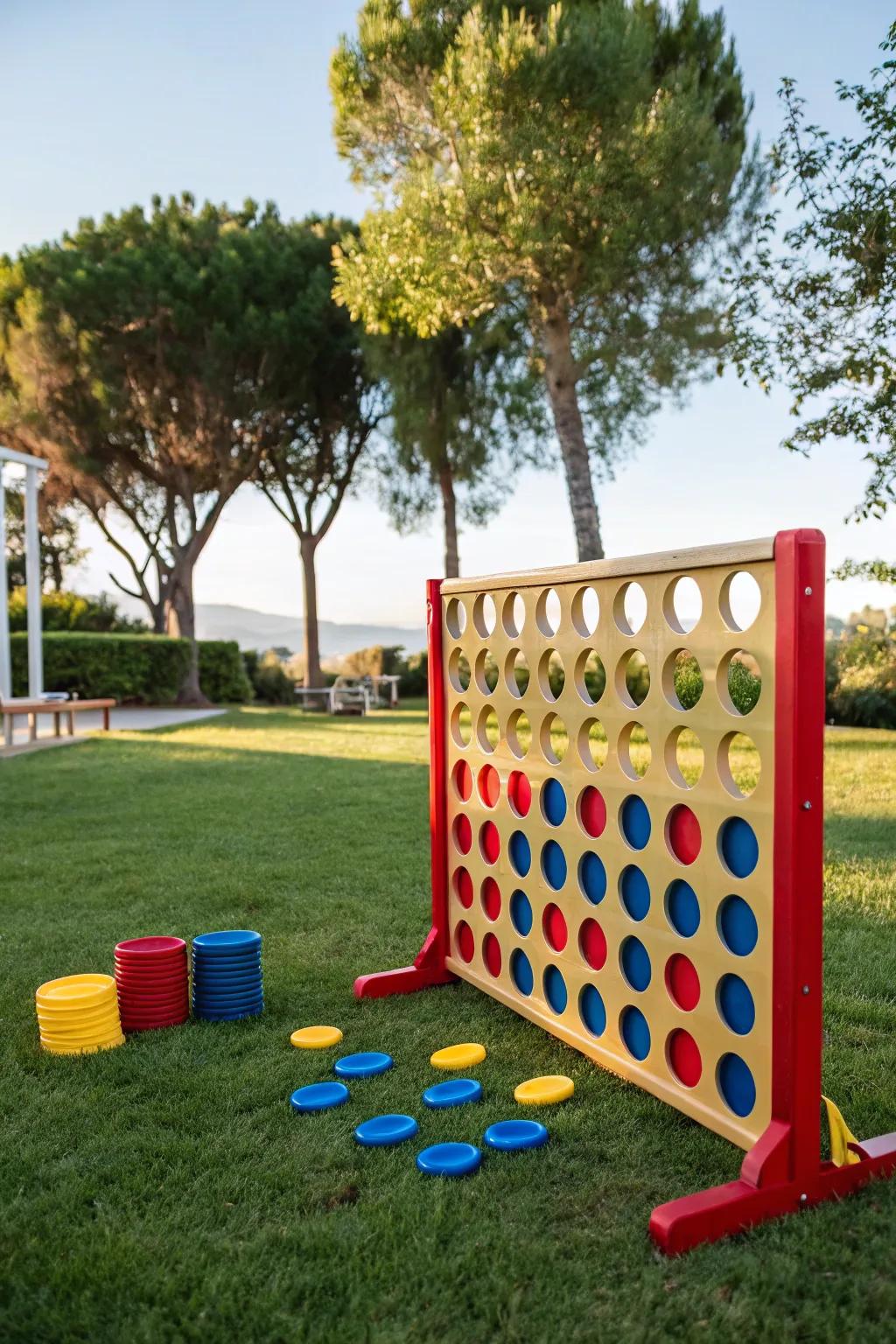 Giant Connect Four game captivating guests at an outdoor party