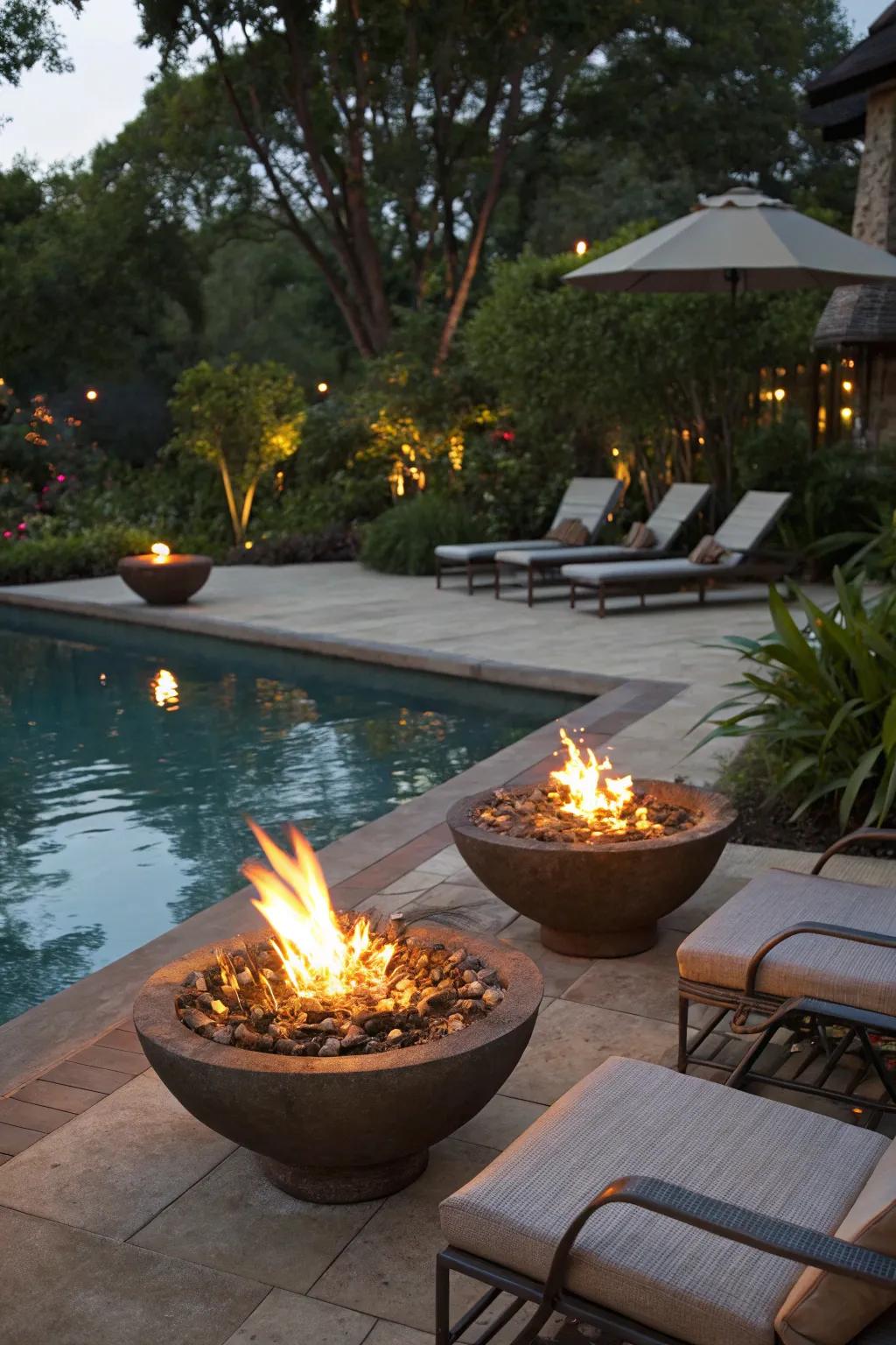 Fire bowls infuse warmth and drama into your poolside.