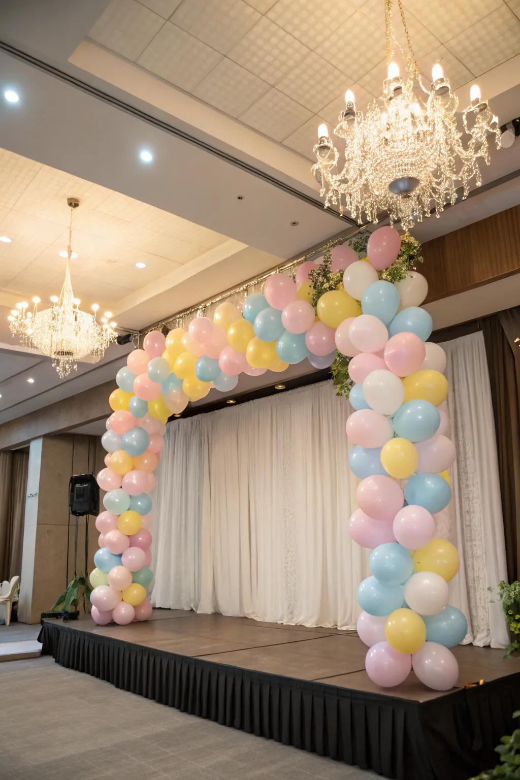 A fanciful balloon luminaire suspended above the stage.
