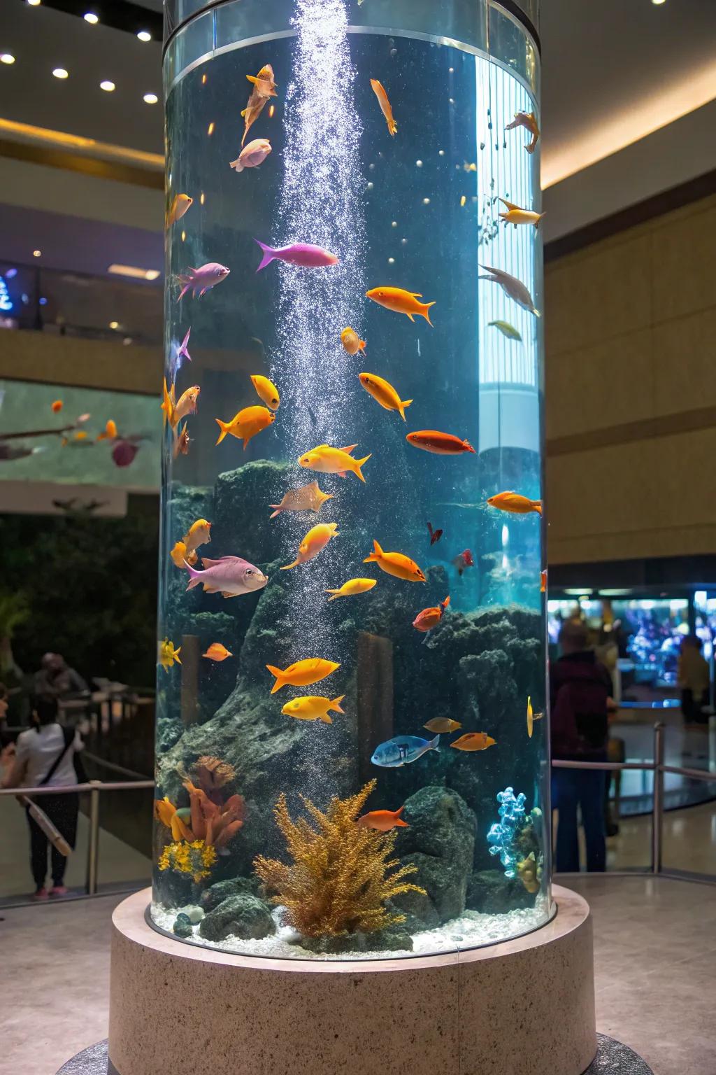 A chromatic assemblage of piscine inhabitants within an elongated aquarium.
