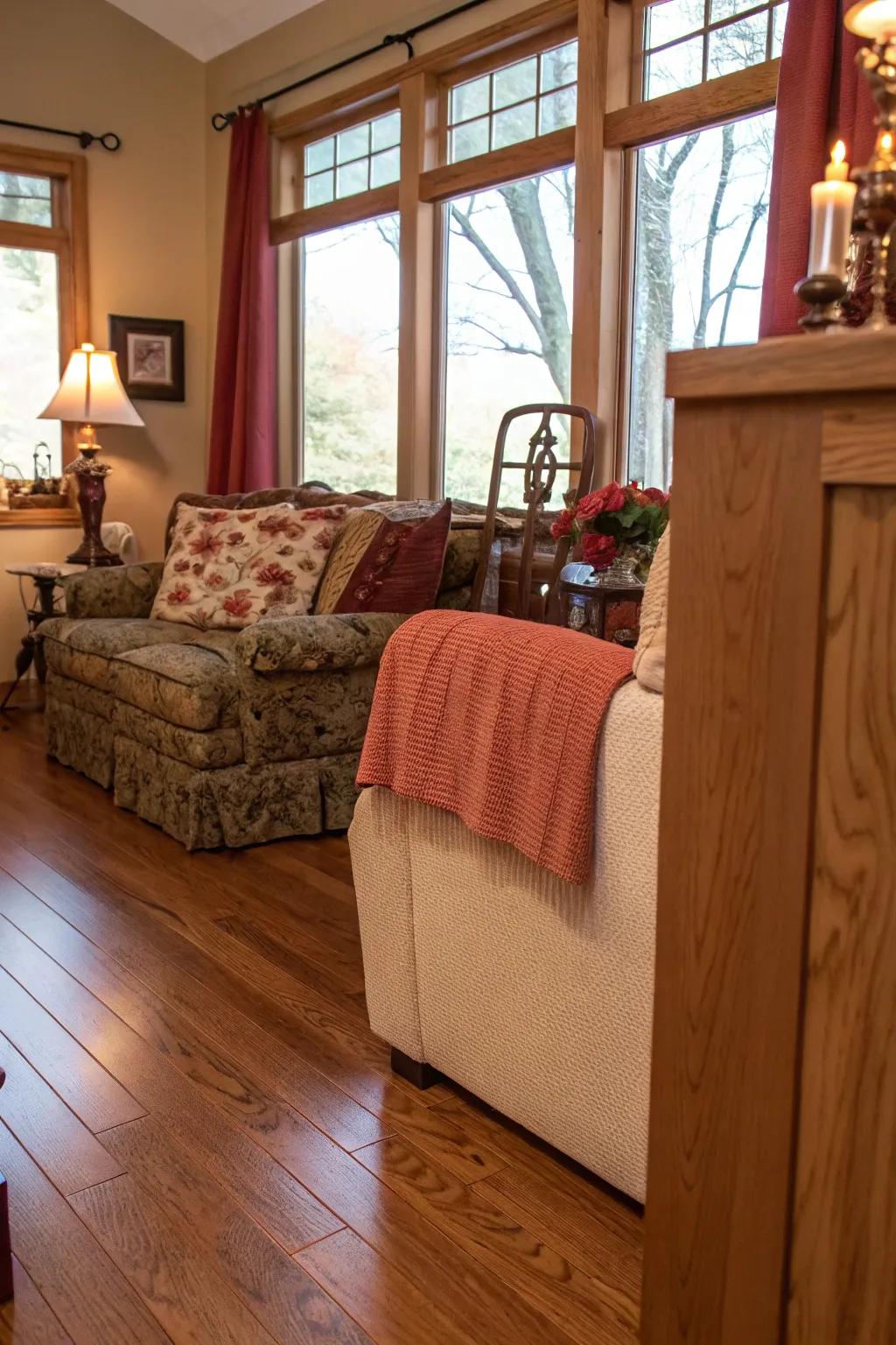 Inviting lounge featuring warm crimson oak flooring.