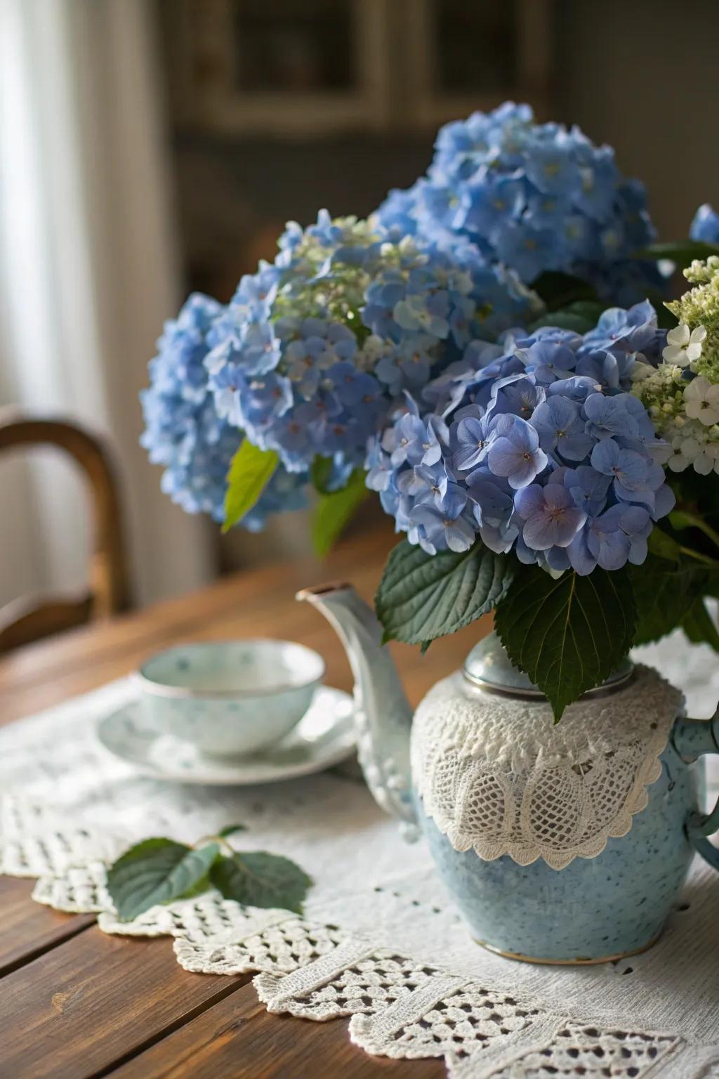 A vintage teapot is a delightful vessel for blue hydrangeas.