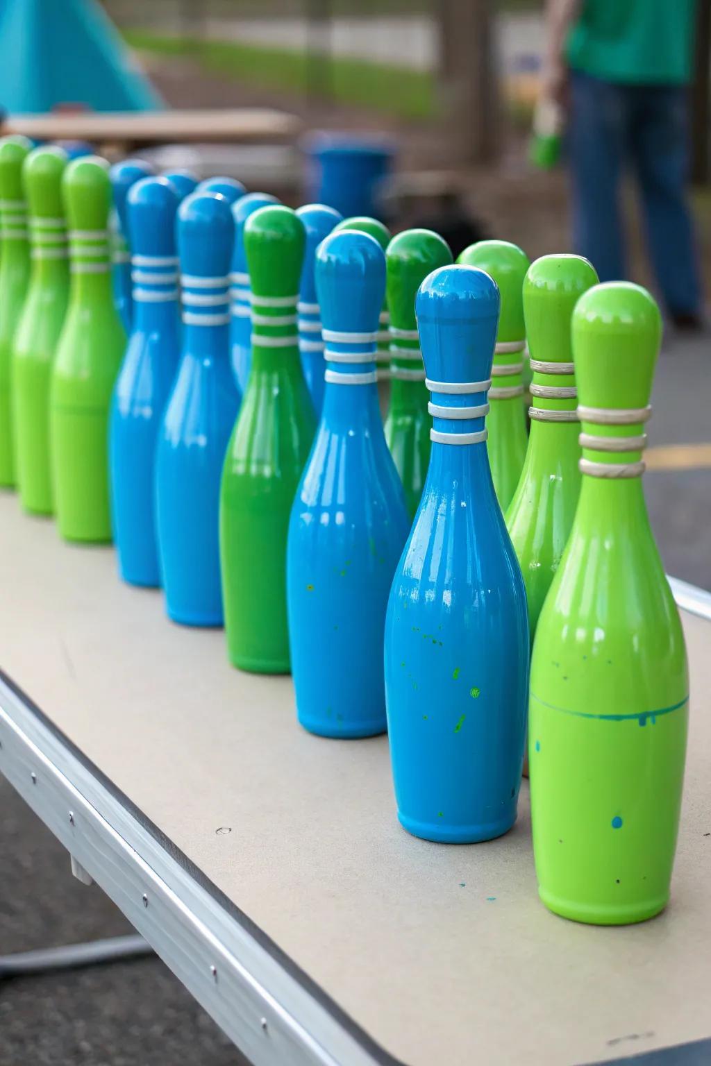 Artistic DIY spray-painted vessels for a unique bowling centerpiece.