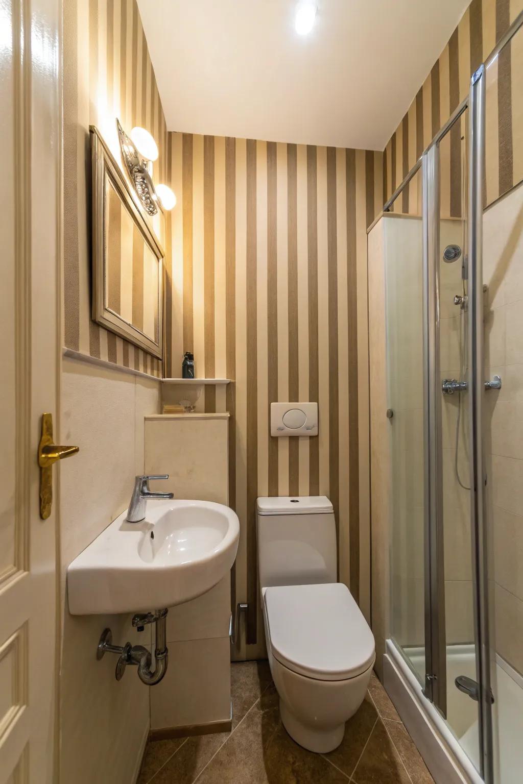 Running stripes add height to this compact bathroom.