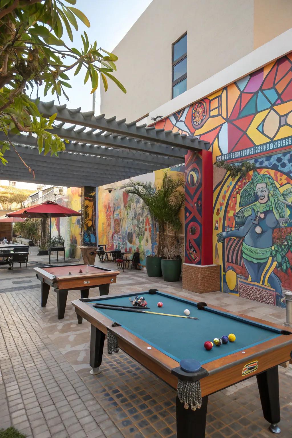 An artistic open-air billiard table precinct, adorned with murals and sculptures.