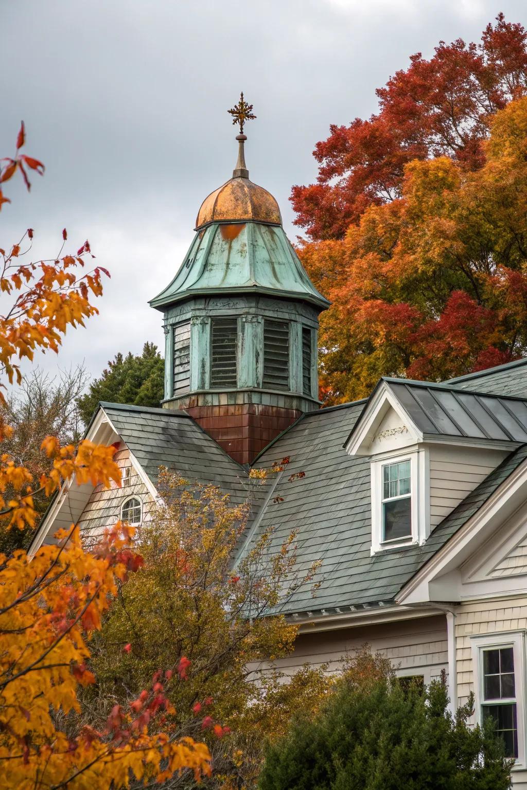 A house featuring a copper cupola with a beautiful patina.