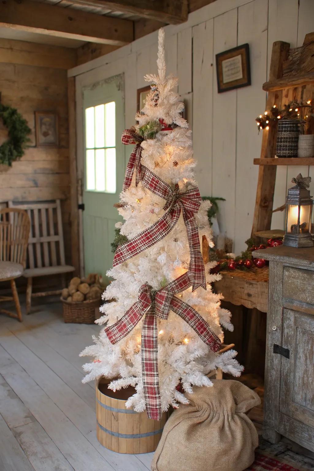 A rustic appeal-themed white pencil tree with burlap and plaid.