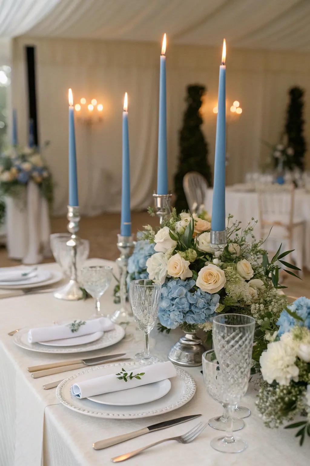 Blue tapered candles impart a romantic glow to the tablescape.
