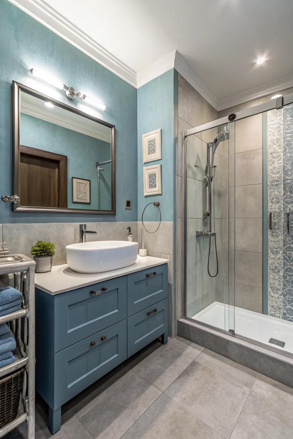 Blue and gray combine for a modern and serene bathroom.