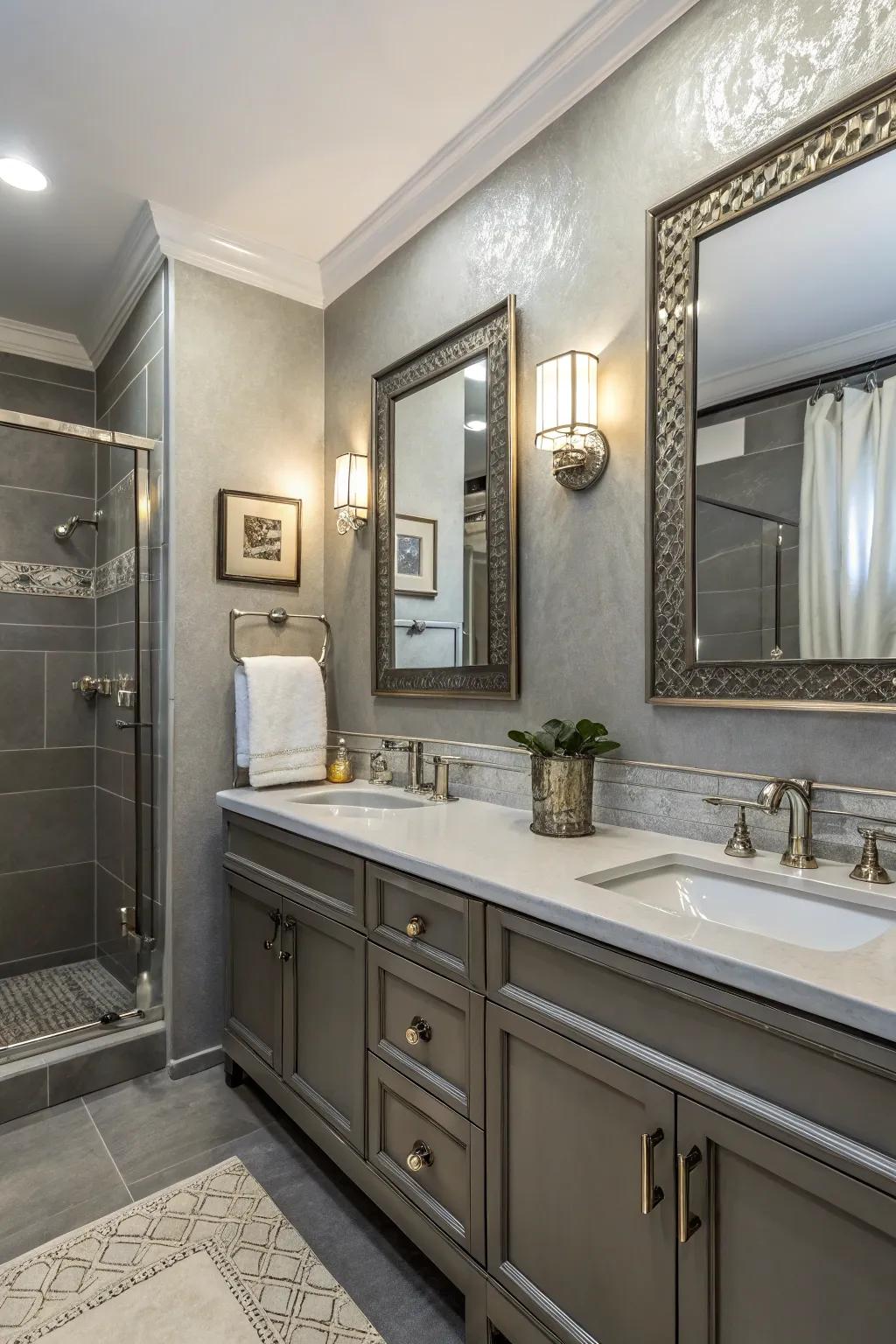 Metallic features add a touch of luxury to the grey bathroom.