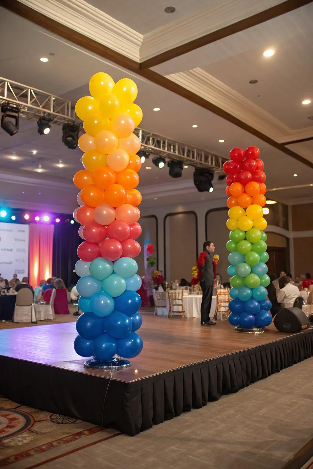 Balloon table accents enhancing the elegance of stage tables.