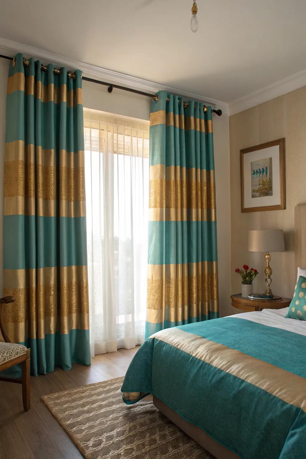Striped window drapes in azure and gold add a bold yet elegant touch to this bedroom.