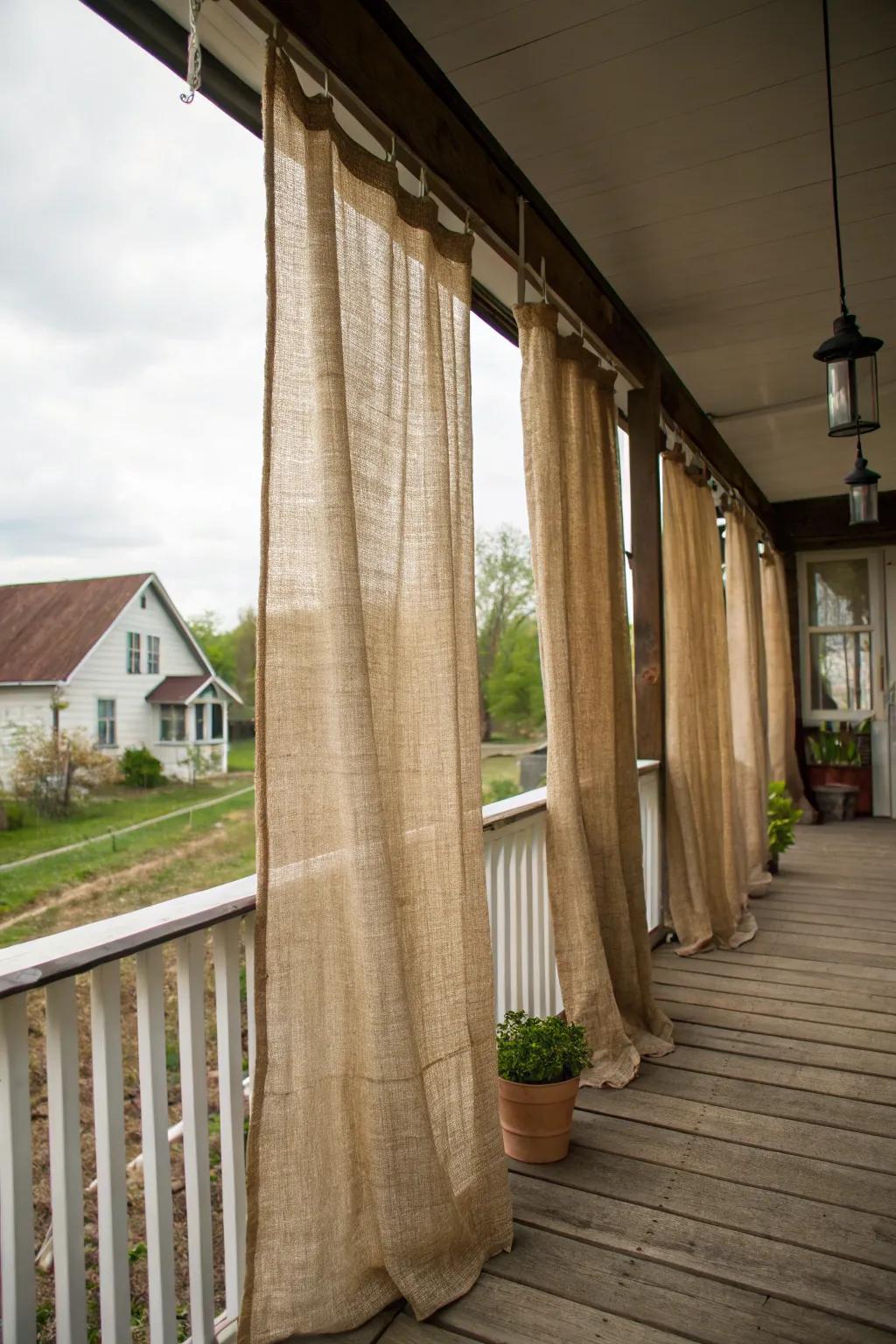 Coarse cloth drapes add countryside elegance and seclusion.