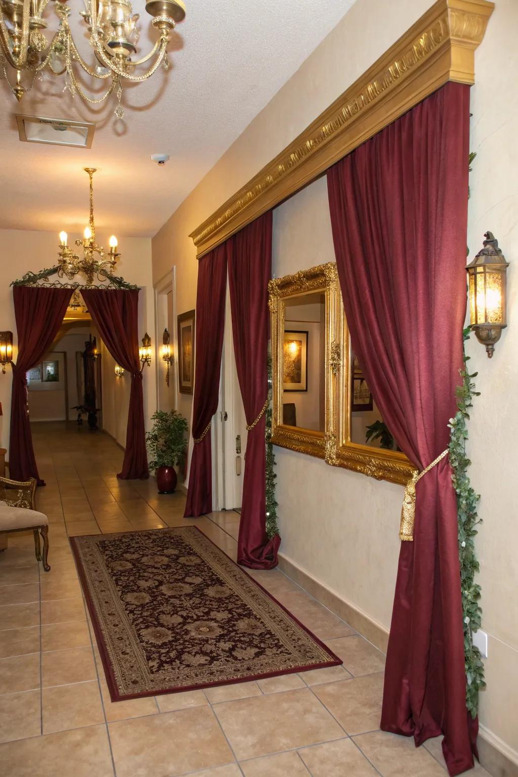 A welcoming entryway with claret and gold décor sets the mood for the event.
