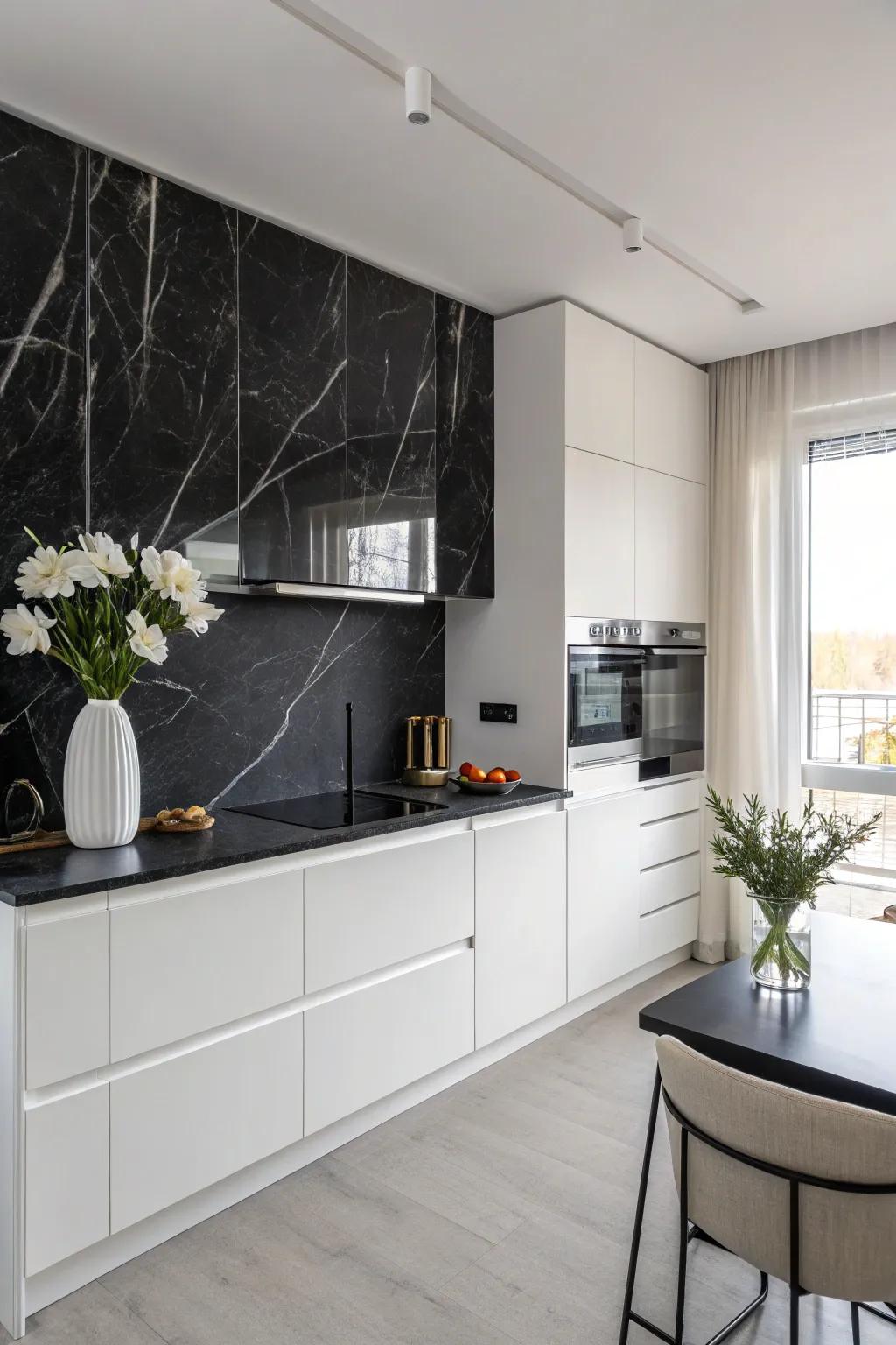 A kitchen featuring a refined black onyx stone backsplash set against minimalist design components.