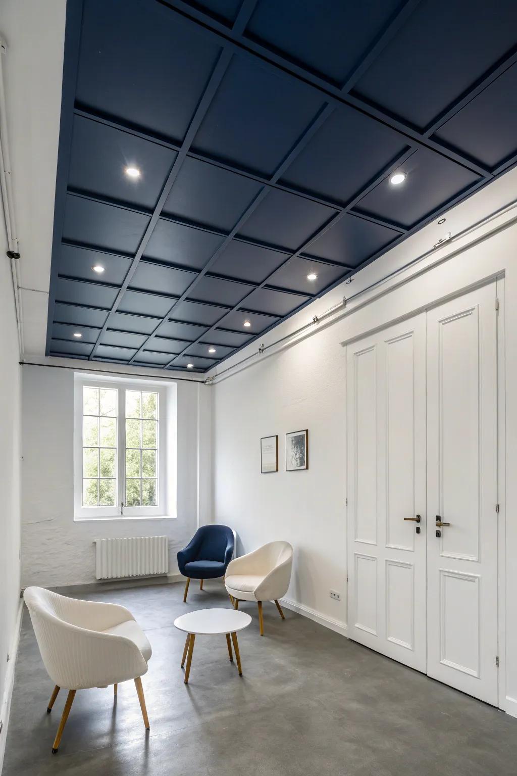 Refined minimalism enhanced by a dark blue ceiling.