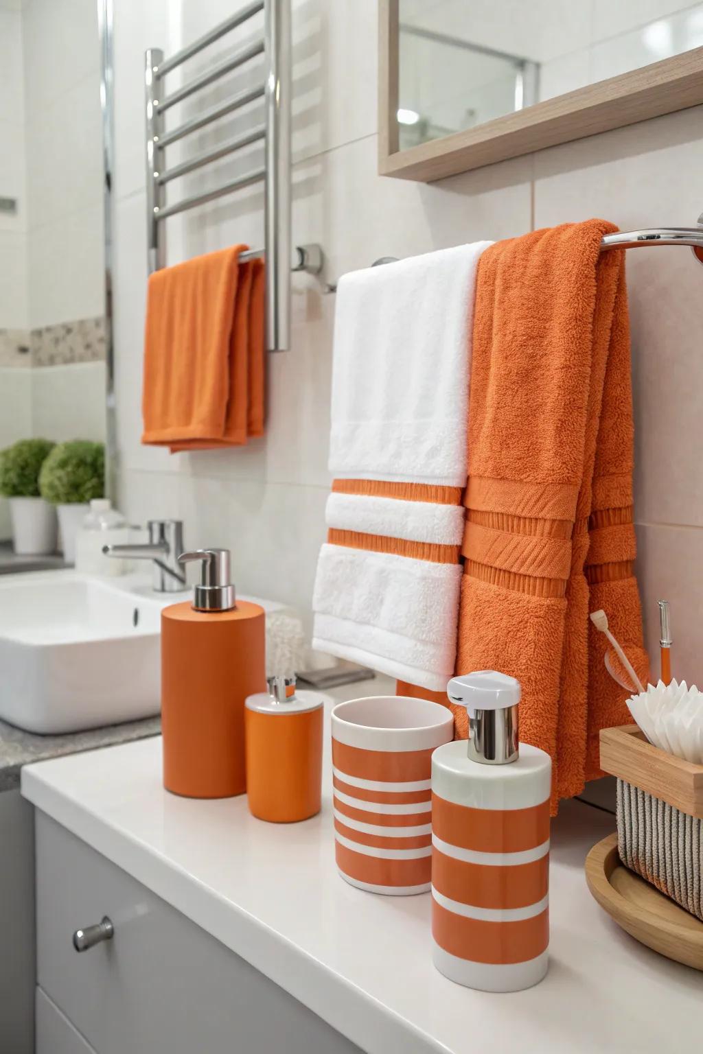 Orange and white accessories enliven a sleek, modern bathroom.