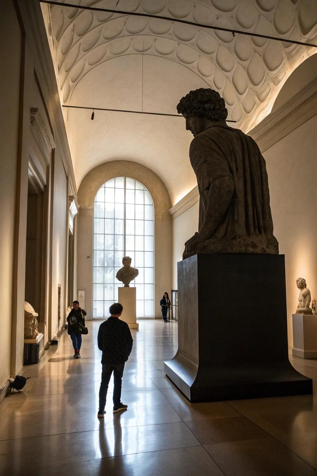 A room where an enormous sculpture overshadows all other decor.