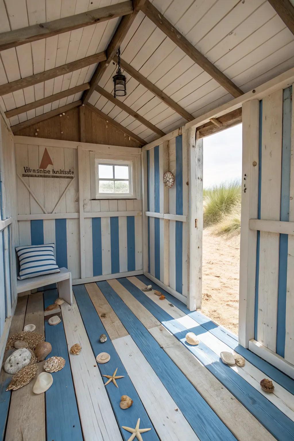 Decorated wood planks in nautical stripes brighten the beach outbuilding interior.