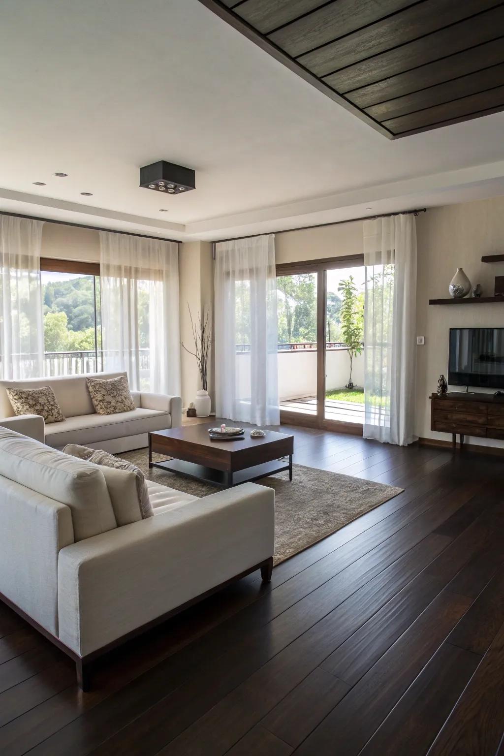Minimal furniture keeps the focus on the beauty of dark floors.