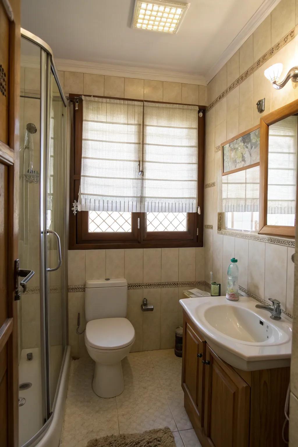 Opaque shades add privacy and light to this compact bathroom.
