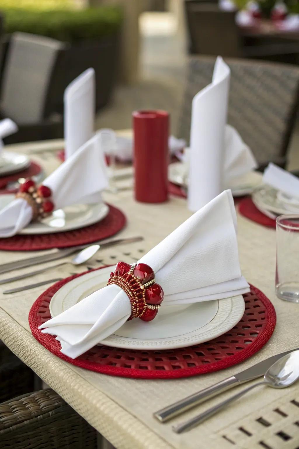 Elegant crimson cloth holders adding refinement to the table.